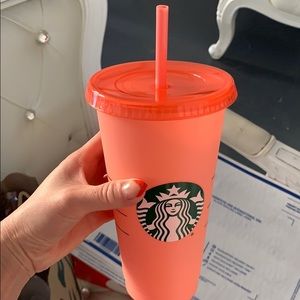 Pink/ coral Starbucks changing color cup